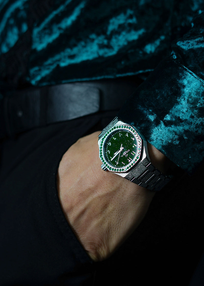 Textured 316L stainless steel watch with a silver frosted finish, protective sapphire glass, and a vibrant green stardust galaxy dial surrounded by green diamonds.