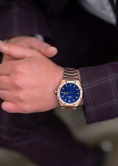 Men gold watch with a blue face