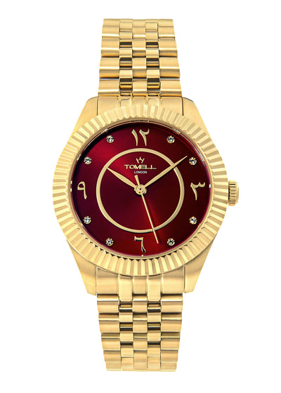 Elegant gold women's watch featuring a round dial with clear Arabic numerals.