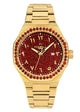 A vivid, close-up photograph of an exclusive Tomell London timepiece, capturing the visceral, heart-pounding weight of its granular gold-frosted majesty. The surrounding diamond halo creates a scintillating luster against the deep-pigment red stardust background, which acts as a vivid sanctuary for the applied heritage Arabic numerals.