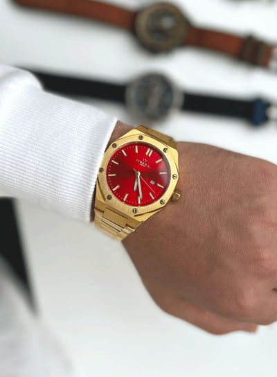 Tomell London gold watch red face 