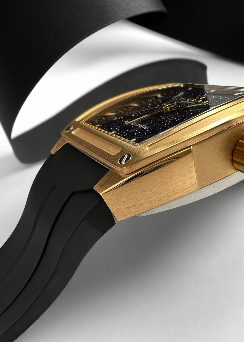Gold watch with black strap and stardust dial 