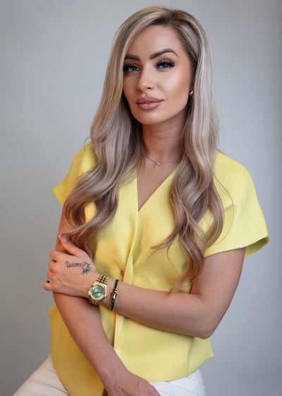 Close-up of the mint watch face highlighting the diamond detail at the 12 o'clock position.