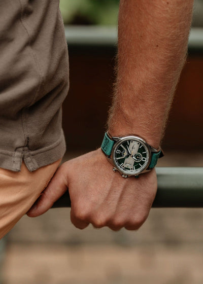 Silver watch for men ith green dial 