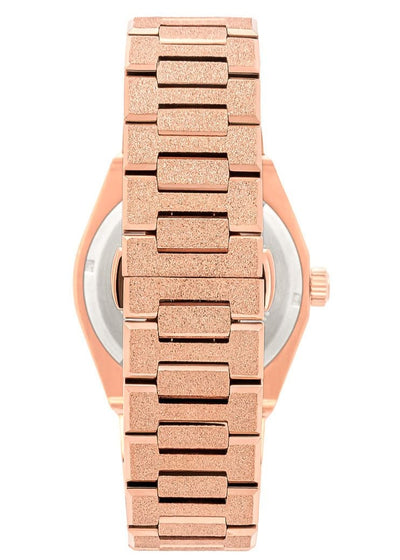 Rose gold watch with a metallic band 