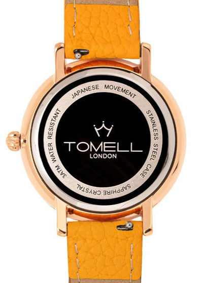 Close-up of ladies' small watch in rose gold. Thin 8mm case and interchangeable taupe strap.