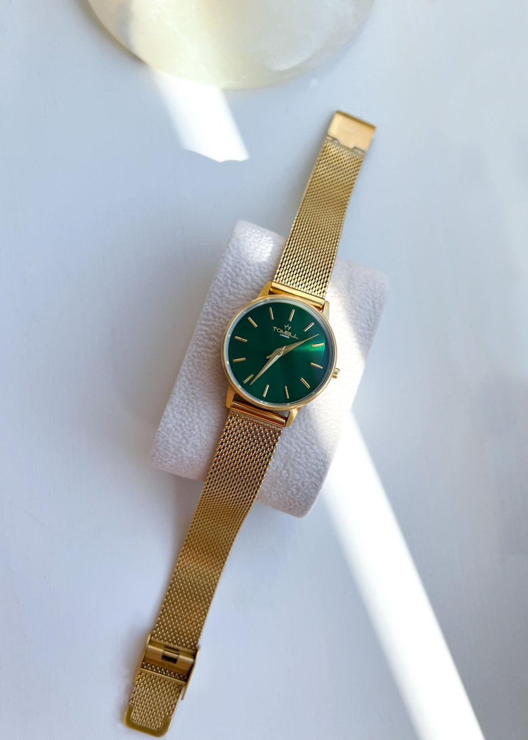 gold green face watch
